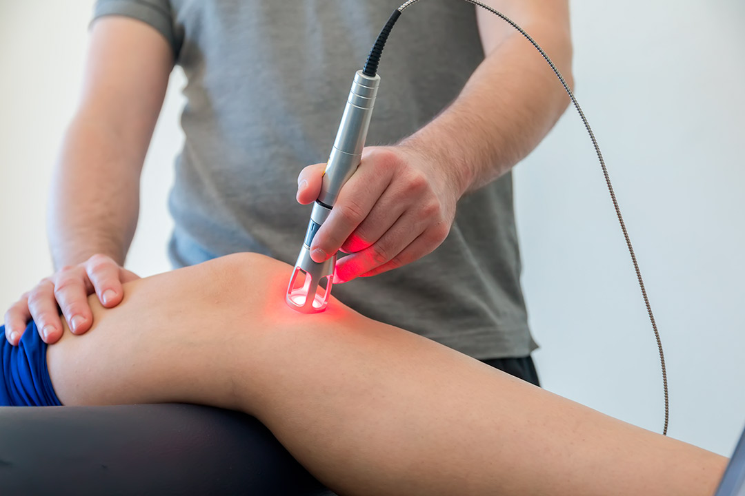 iv laser therapy over knee and leg.