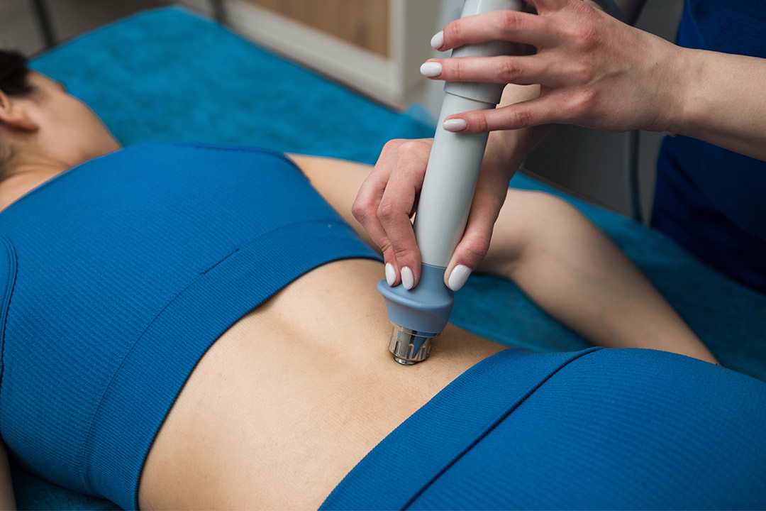 A woman receiving treatment machine equipment, highlighting the benefits of MyACT technology in fitness centers.
