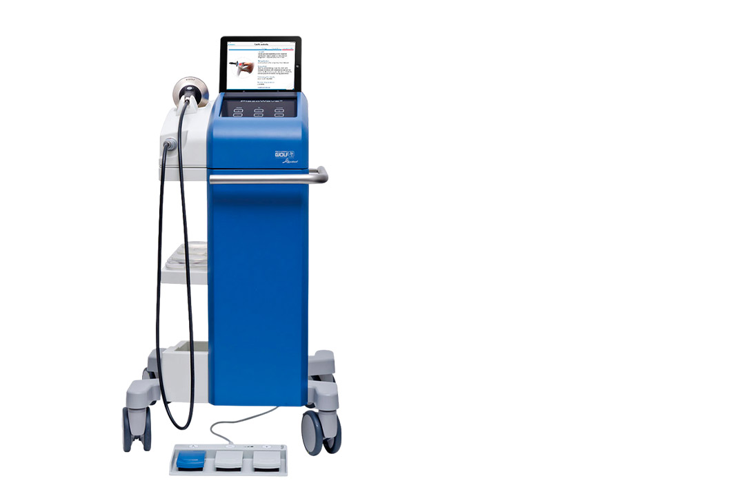 A blue and white shockwave therapy machine with a tablet on top, illustrating options for rental selection.