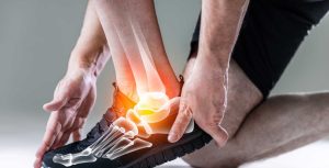 Ankle and foot of a male athlete during sporting activity with x-ray image. Ankle pain in detail - Sports injuries concept
